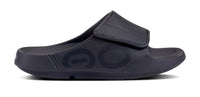 OOFOS Sport Flex slide in matte black, lateral profile with the strap fastened